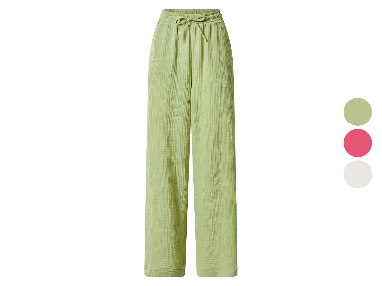 Grüne Musselin-Damenhose mit verstellbarem Kordelzug und Farbmustern.