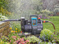 Gardena Automatic-Pumpe mit Schlauch im Garten.