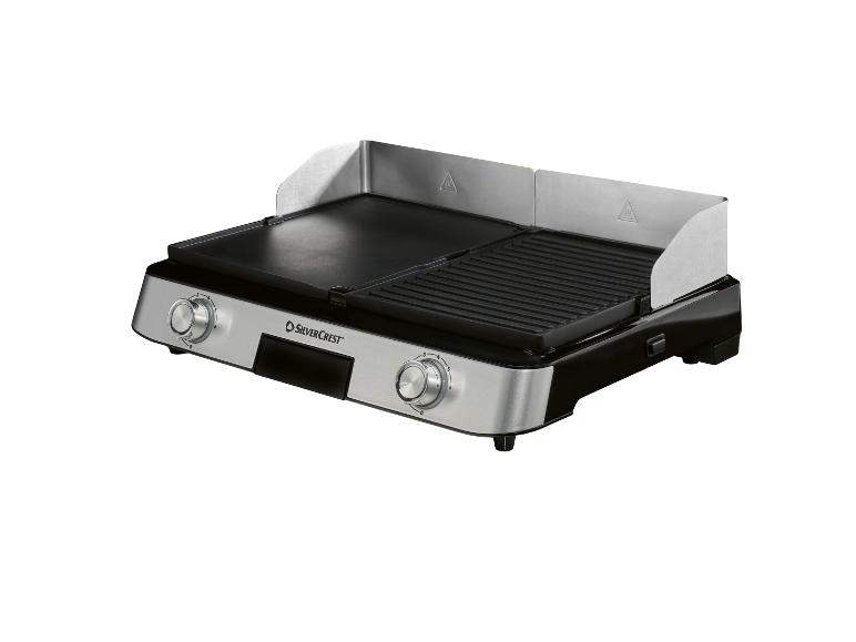 Tisch-Elektrogrill mit glatten und geriffelten Platten sowie Temperaturreglern.