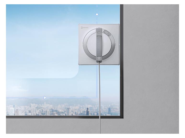 ECOVACS Fensterputzroboter auf Glas mit Stadtblick