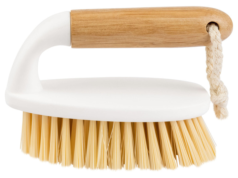 Eine weiße Bürste mit Holzgriff und Schnur.