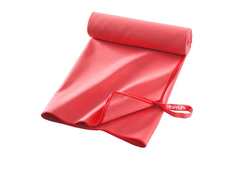 Rote Crivit Sport-Handtuch, Mikrofaser, kompakt.