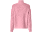 Rosa Rollkragenpullover aus Grobstrick.