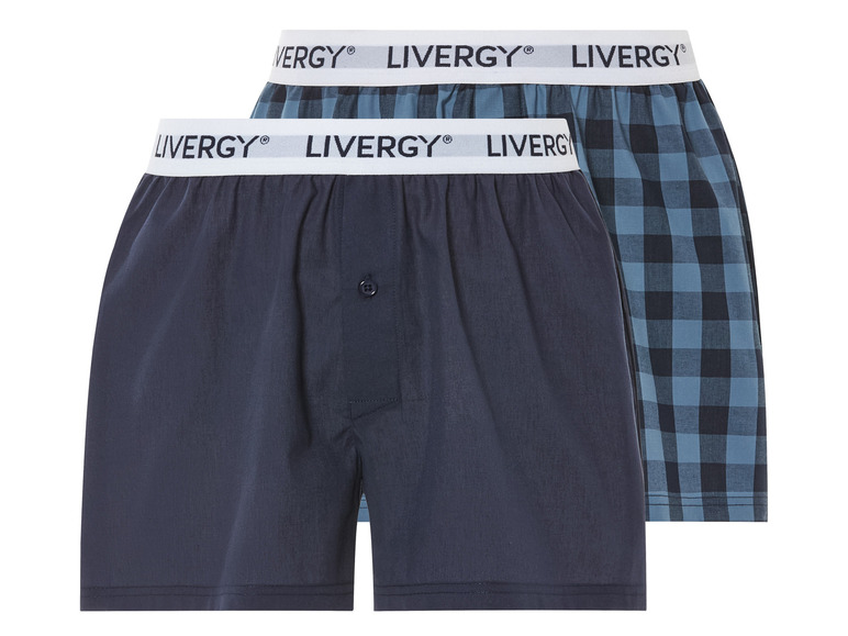 Zwei Paar blaue Boxershorts von Livergy, einfarbig und kariert.