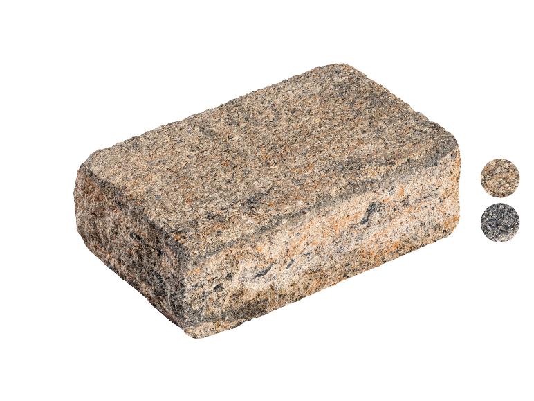 Einzelner Pflasterstein in Beige- und Grautönen