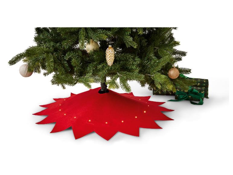 Rote LIVARNO Weihnachtsbaumdecke mit LED-Beleuchtung.