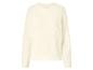 Cremefarbener, flauschiger Langarmpullover.