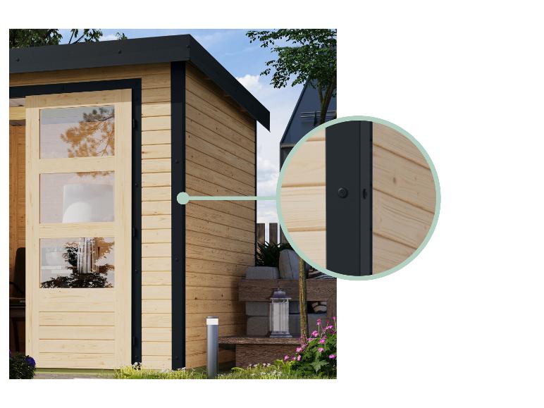 Ein Holz-Gartenhaus mit schwarzen Akzenten.