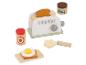 Holzspielzeug-Toaster mit Toast, Marmelade, Aufstrich, Butter und Spiegelei auf Schneidebrett.