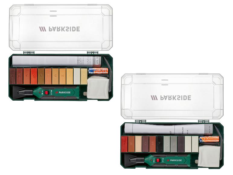 Zwei Bodenreparatursets mit farbigem Wachs und einem Heizwerkzeug.