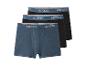 Drei Herren-Boxershorts, eine blaue und zwei schwarze, mit esmara-Branding am Bund.
