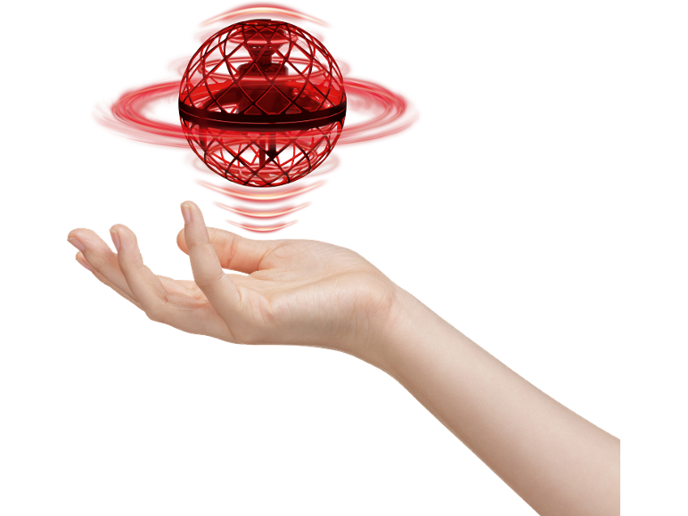 Roter fliegender Spinner-Ball, der über einer offenen Hand schwebt