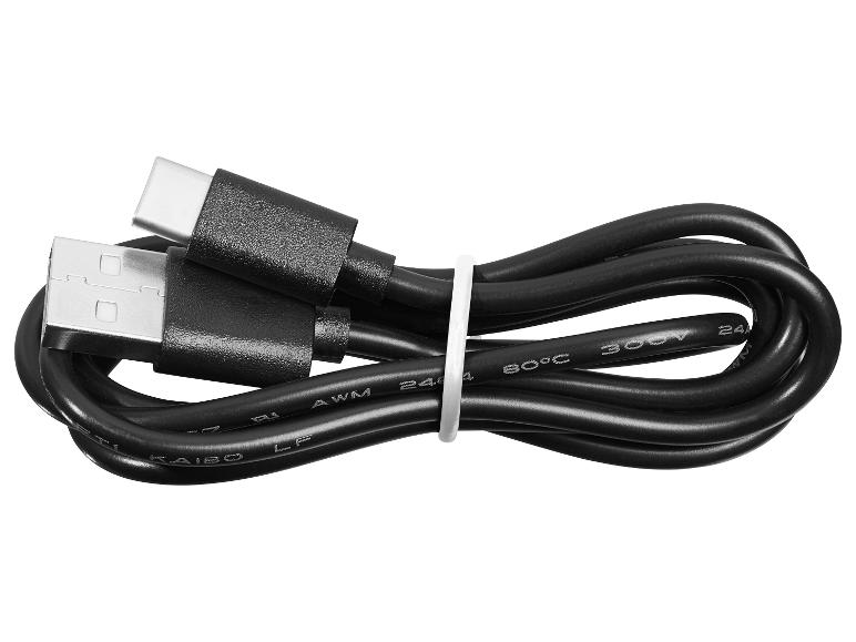 Schwarzes aufgerolltes USB-Ladekabel mit USB-A und USB-C Anschlüssen