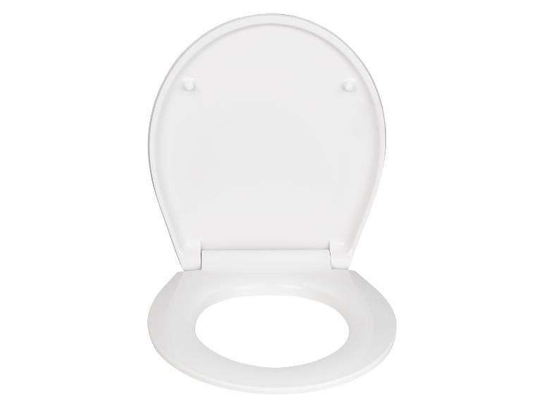 Weiße, keramische Toilettensitz.
