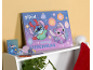 Adventskalender mit Stitch- und Angel-Motiv, mit dem Text „Merry Stitchmas“.