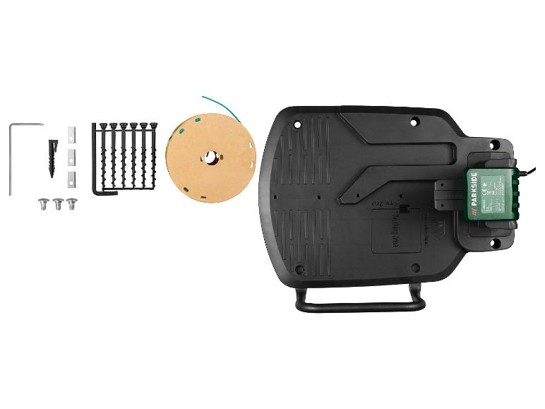 Zubehör für Rasenroboter, inklusive Begrenzungskabel, Heringe und Ladegerät.