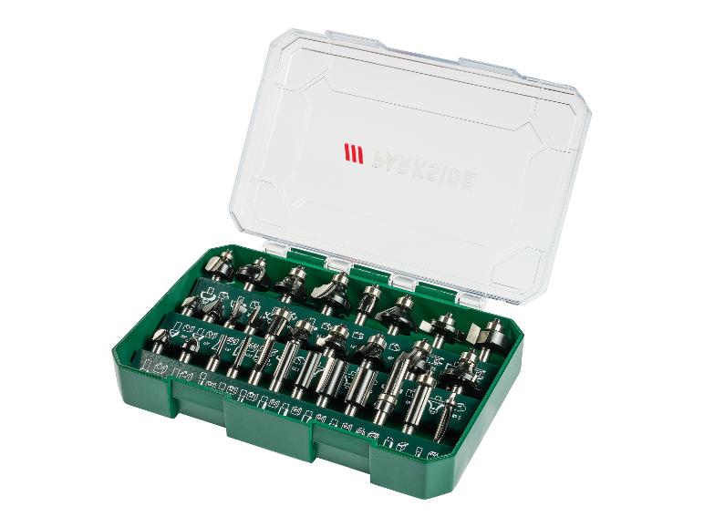 Ein Satz Fräser in einem grünen Gehäuse mit transparentem Deckel.