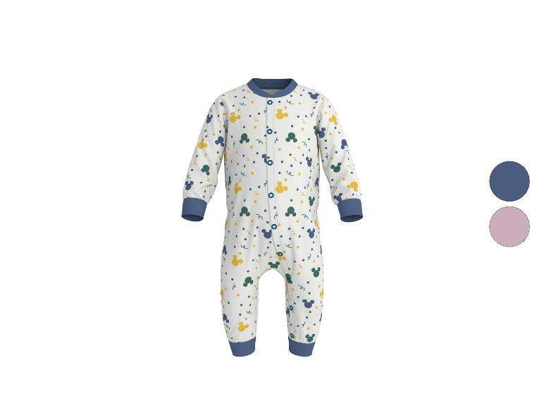Weißer Baby-Strampler mit blauen, gelben und grünen Mustern.