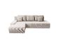 Beige Eckcouch aus Cordstoff.