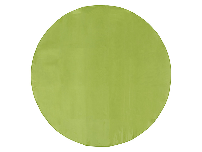 Eine runde grüne Tischdecke.