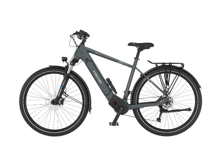 Graues Elektro-Trekkingrad mit Federgabel, Scheibenbremsen und Gepäckträger.