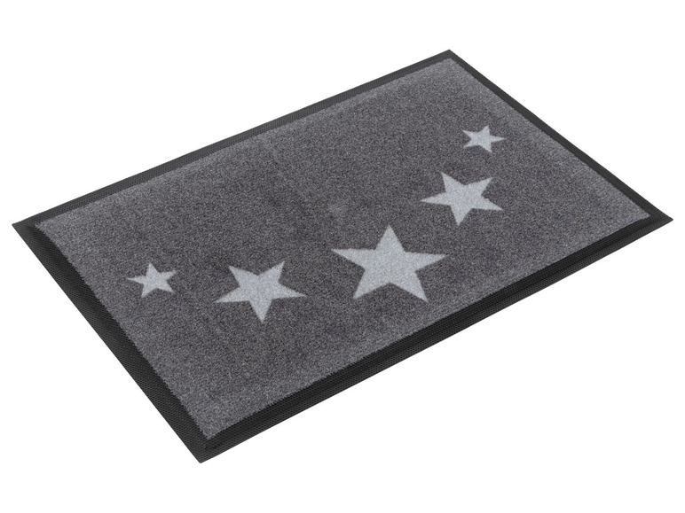 Ein grauer Fußabtreter mit Sternen