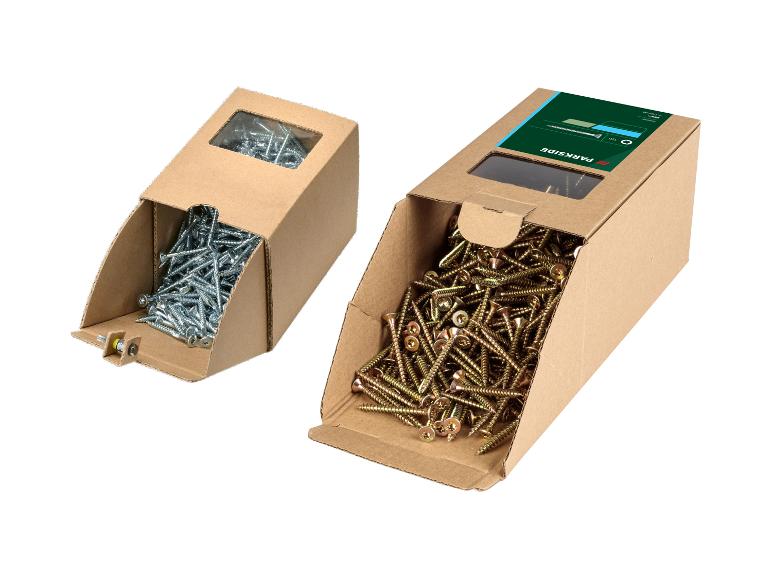 Zwei Kartons Schrauben, einer silber und einer gold, mit der Marke Parkside.