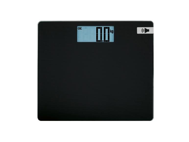 Schwarze Personenwaage mit Digitalanzeige, die „0.0 kg“ und ein Lautsprechersymbol anzeigt