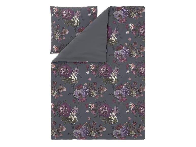 Bettwäsche-Set mit Blumenmuster auf dunkelgrauem Hintergrund.