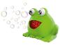 Grüne Frosch-Seifenblasenmaschine bläst bunte Seifenblasen.
