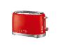 Roter Toaster mit zwei Schlitzen und Chromdetails, mit der Aufschrift „1973“