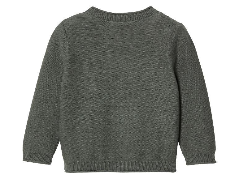 Ein dunkelgrüner Pullover mit langen Ärmeln.