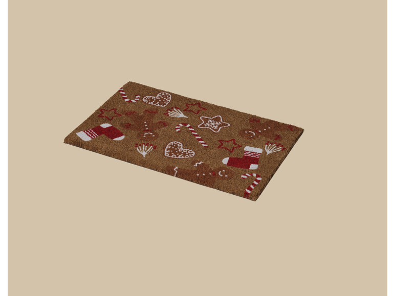 Kokos-Fußmatte mit Weihnachtsmuster, inklusive Socken, Zuckerstangen und Herzen.