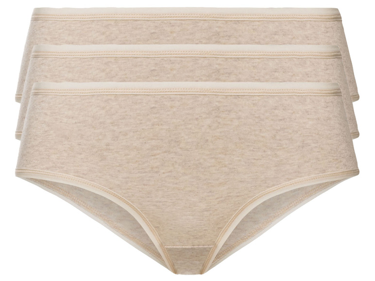 Drei Paar beige Unterhosen.