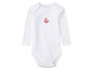 Ein weißer Baby-Body mit rotem Anker.