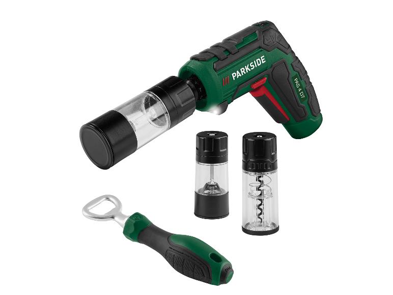 Wein- und Gewürzset mit grün-schwarzem Flaschenöffner und elektrischer Mühle.