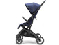 Ein blauer Bugaboo Cameleon 3 Kinderwagen.