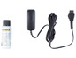 Ein Karcher Reinigungsmittel, ein Adapter und ein Kabel.
