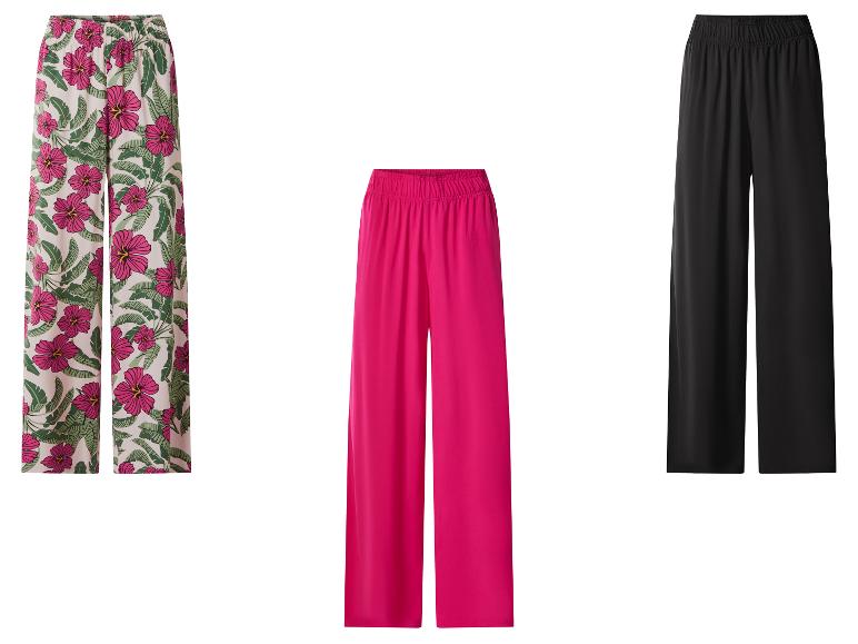 Drei weite Hosen: geblümt, fuchsia und schwarz.