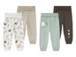 Drei Paar Babyhosen: eine mit Schafen und Vögeln, eine mit einem grauen Schaf und eine einfarbige braune.