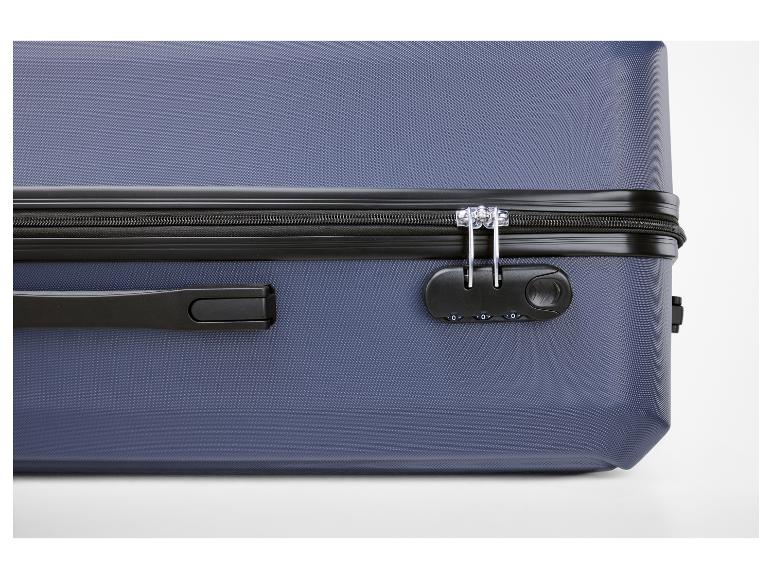 Blauer Koffer mit schwarzem Reißverschluss und Zahlenschloss.