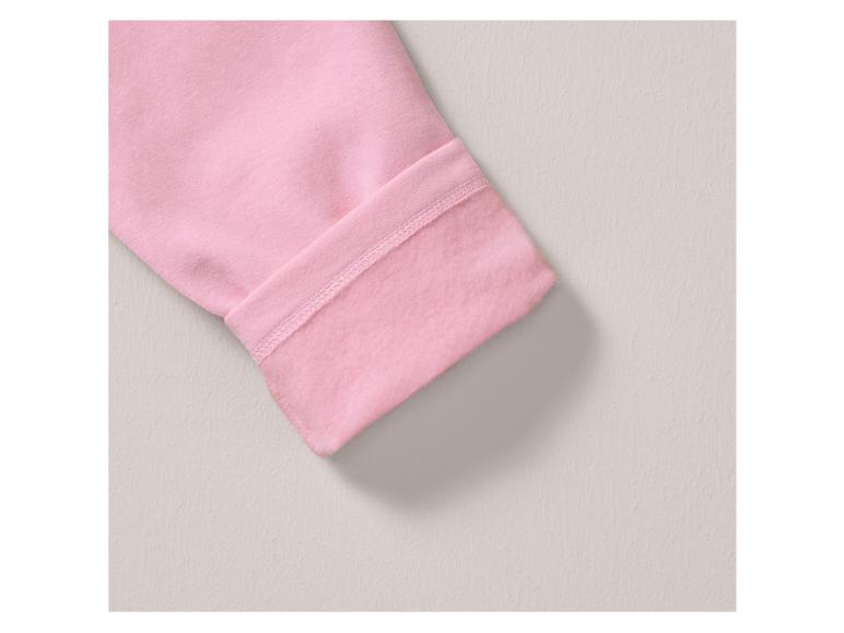 Ein rosa Ärmel mit Fleecefutter.
