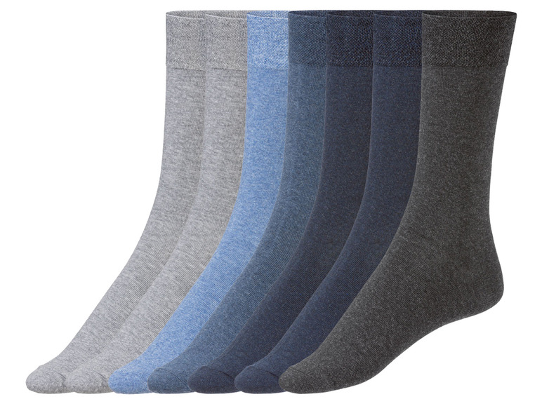 Sechs Paar Socken in Grau und Blau.