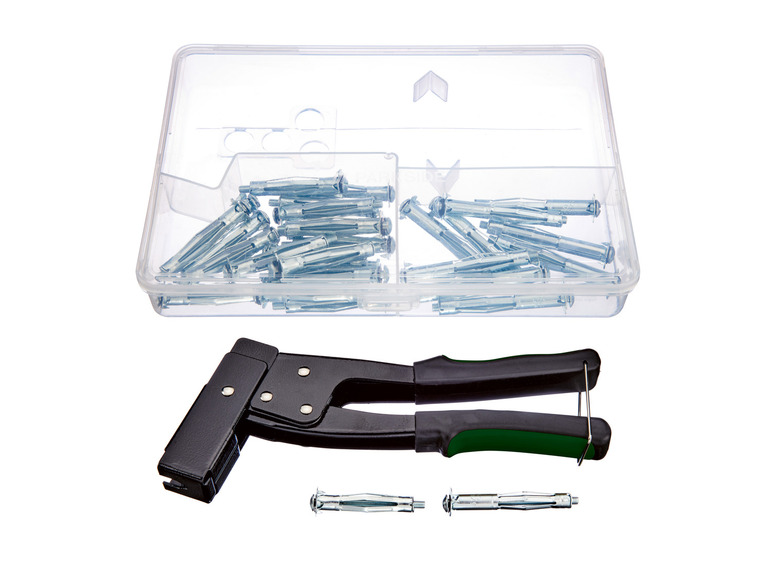 Ein Set mit einem Werkzeug für Dübel und Dübel in einer Box.