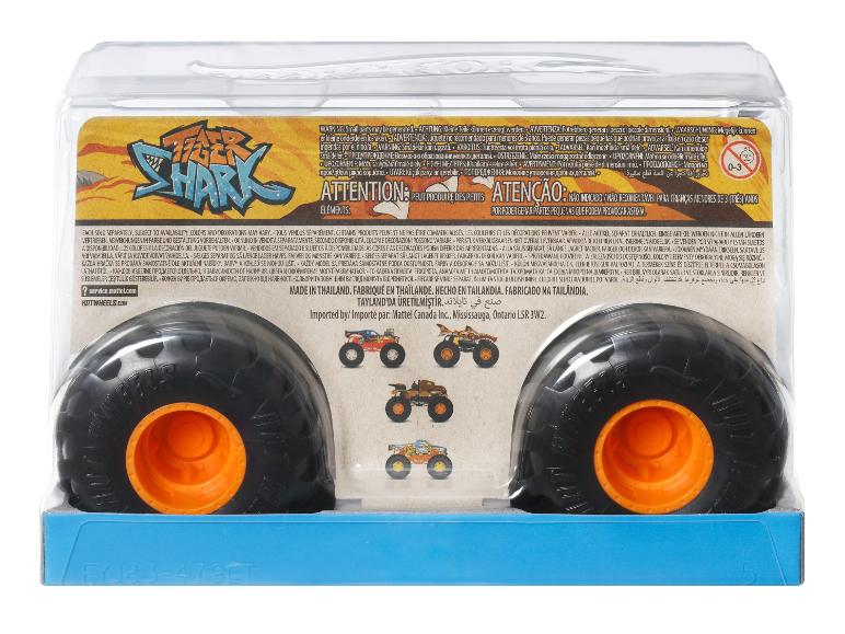 Verpackung eines Spielzeug-Monstertrucks mit großen Rädern und Warnhinweisen.