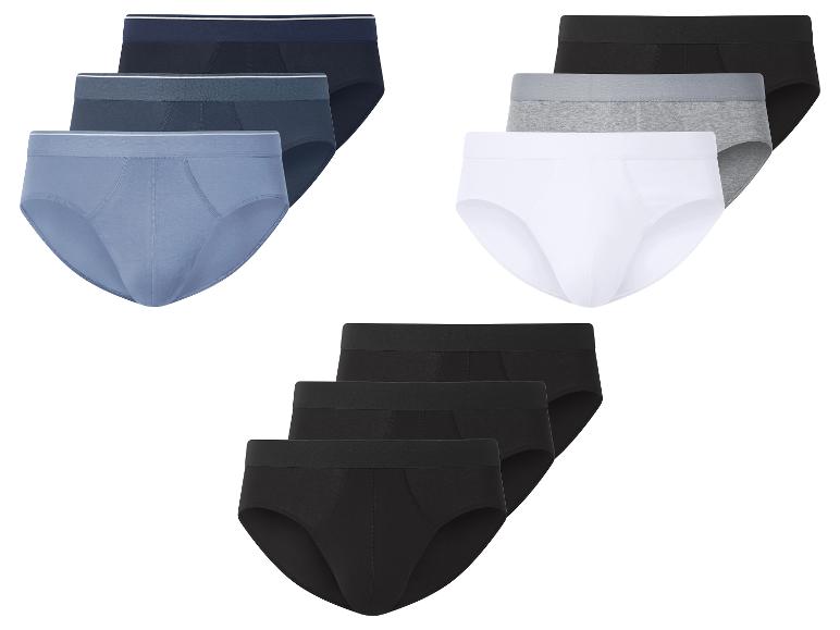 Drei Sets Herrenslips in Blau, Schwarz, Weiß und Grau
