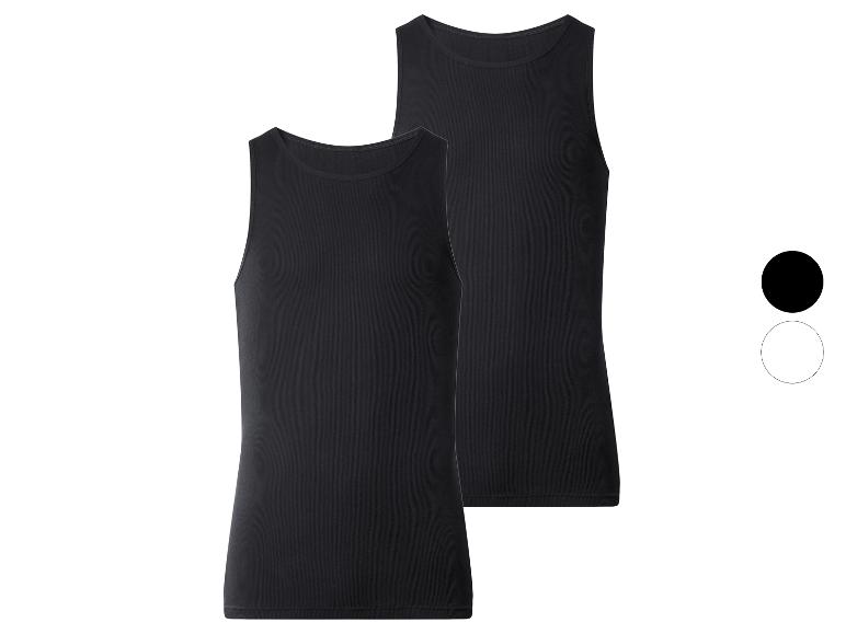 Zwei schwarze gerippte Tanktops, eines leicht hinter dem anderen, mit Farbmustern.