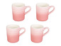 Vier rosafarbene Le Creuset Kaffeetassen mit Ombre-Effekt.