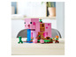 Lego Minecraft Set mit einem großen rosa Schwein und Minifiguren.