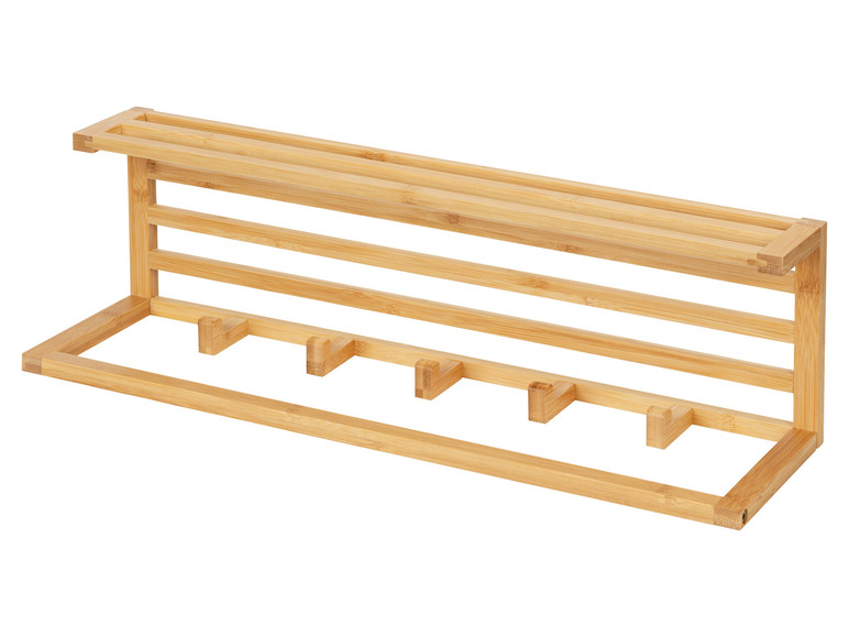 Ein Holz-Kleiderhaken mit fünf Haken.